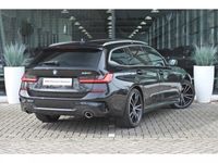 tweedehands BMW 320 3-SERIE Touring i High Executive M Sport Automaat / Panoramadak / LED / Parking Assistant / Live Cockpit Professional / Stoelverwarming / M Sportonderstel