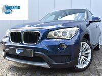 tweedehands BMW X1 sDrive20i AUT. Chrome Line 2013 Tiefseeblau Xenon Navi Clima Cruise 18" LMV PDC Trekhaak