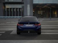 tweedehands BMW 320e 3-SERIE TouringM Sport Automaat / Panoramadak / Trekhaak / Sportstoelen / Active Cruise Control / Widescreen Display / Harman Kardon