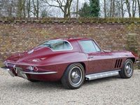 tweedehands Chevrolet Corvette C2 Coupe 427 Finished in Milano Maroon over black vinyl upholstery, Extensive frame-off restoration fully captured in photographs, Fitted with Turbine-style 15? knock-off wheels, Powered by the "big block" 427ci engine and mated to a ma