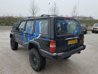 tweedehands Jeep Cherokee 1999, BOSTIJGER OP HOGE POTEN.