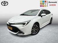 Occasion Toyota Corolla Hybrid Premium 2024 Wit Stationwagen