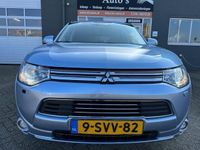 tweedehands Mitsubishi Outlander 2.0 PHEV Instyle met elec. schuifdak en leer en navigatie en bluetooth telefoon / media en parkeercamera