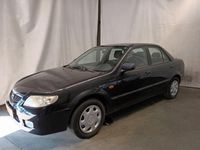 tweedehands Mazda 323 1.6i "Navigator" - Schade