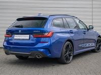 Occasion BMW 330e Executive 292 PK (214 kW) 2022 Blauw Stationwagen