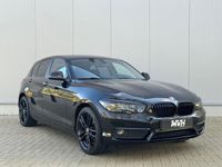 tweedehands BMW 116 1-SERIE i Centennial High Executive - M-Sport - Airco - Cruise - Stoelverwarming - Black on Black - Camo