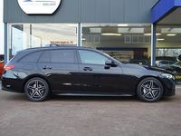 Occasion Mercedes C200 AMG line 204 PK (150 kW) 2021 Zwart Stationwagen