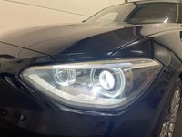 tweedehands BMW 118 1-SERIE i Executive Upgrade Black on Black, Panorama/Schuifdak, Navi Groot, Sport interieur