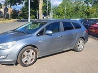 Occasion Opel Astra Selection 101 PK (74 kW) 2011 Grijs Stationwagen