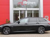 tweedehands BMW 320e 3-SERIE Touring204PK AUTOMAAT HYBRID M-SPORT | CURVED DISPLAY | ELEKTRISCH WEGKLAPBARE TREKHAAK | PANORAMISCH SCHUIF/KANTEL DAK | APPLE CARPLAY | ELEKTRISCHE ACHTERKLEP | STOEL VERWARMING | NAVIGATIE | ADAPTIVE CRUISE CONTROL | DAB+ RADIO | 18"