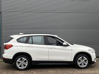 tweedehands BMW X1 sDrive18i High Executive Aut. | Afneembare trekhaak | Stoelverwarming | Navigatie | PDC | Électric. achterklep