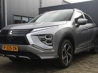 tweedehands Mitsubishi Eclipse Cross 2.4 PHEV Executive | Incl 1 jaar garantie | Trekhaak | 1ste eigenaar! | Dealeronderhouden | 360° camera | Adaptive cruise | Clima | Stoelverwarming voor + achter | Stuurverwarming | Apple carplay | Full LED | Bomvol in de opties |