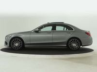 tweedehands Mercedes C200 Prestige AMG Line | Airmatic | Trekhaak | Panoramadak | Distronic | Burmester Audio | Memory | Head up Display | Keyless Go |