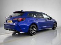 Occasion Toyota Corolla Hybrid Limited 2023 Blauw Stationwagen