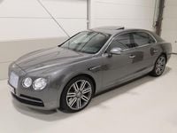 Occasion Bentley Flying Spur Mulliner 509 PK (374 kW) 2015 Grijs, metallic lak Sedan