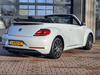 tweedehands VW Beetle Cabriolet 1.4 TSI 150PK DSG Exclusive Series | Navi | Xenon | Cruise control | Stoelverwarming | Automaat | Windscherm |