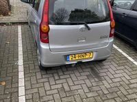 Occasion Daihatsu Cuore 69 PK (50 kW) 2009 Grijs Hatchback