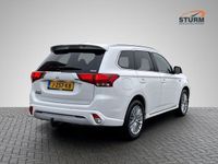 tweedehands Mitsubishi Outlander 2.4 PHEV Instyle Trekhaak Schuif-/Kanteldak Navigatie Camera Leder Stuur- + Stoelverwarming Adapt. Cruise Control Rijklaarprijs!