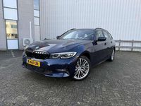 Occasion BMW 330e 184 PK (135 kW) 2021 Blauw Stationwagen