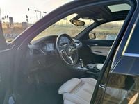 Occasion BMW 118 Executive 136 PK (100 kW) 2019 Zwart Hatchback