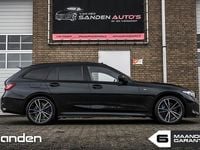 Occasion BMW 330 Basis 291 PK (214 kW) 2023 Zwart Stationwagen