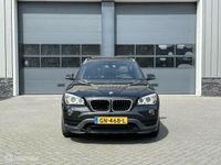 tweedehands BMW X1 sDrive20i Sportline Panodak Automaat Leer Navi Trekhaak PDC Xenon NL Auto