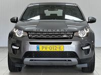 tweedehands Land Rover Discovery Sport 2.0 eD4 E-Capability SE/ DB Ketting Vervangen!/ Trekhaak/ Zwarte-Hemel/ 19'' LMV/ Bi-Xenon!/ Camera/ Stoel + Stuurverw./ LEDER/ 2X Elek. Stoel/ Keyless-GO/ Lane-Assist./ Panorama-Dak/ Bluetooth.