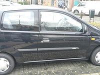 Occasion Daihatsu Cuore 58 PK (42 kW) 2004 Zwart Hatchback