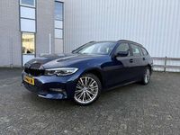 Occasion BMW 330e 184 PK (135 kW) 2021 Blauw Stationwagen