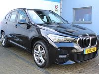 tweedehands BMW X1 sDrive18i High Executive Edition M-pakket | Incl. 1 jaar Garantie | Panorama dak | Elektrische kofferbak | Climate controle | Stoelverwarming | Parkeersensoren V+A | Navigatie | Cruise controle | Lederen bekleding | Harman/Kardon audiosysteem | Hea