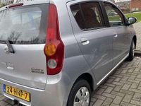 Occasion Daihatsu Cuore 69 PK (50 kW) 2009 Grijs Hatchback