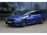 Occasion BMW 330 294 PK (216 kW) 2023 Blauw Stationwagen