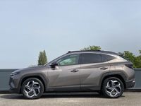 tweedehands Hyundai Tucson 1.6 T-GDI HEV Premium Sky | Panoramische schuif-kanteldak | Lederen bekleding | 19'' Two-tone | Adaptieve cruisecontrol |