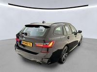 Occasion BMW 320e M Sport 163 PK (119 kW) 2022 Zwart Stationwagen