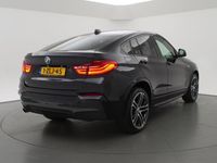 tweedehands BMW X4 xDrive20i 184 PK M-SPORT CARBONSCHWARZ