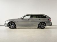 Occasion BMW 330 Performance 291 PK (214 kW) 2023 Grijs Stationwagen