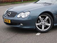 tweedehands Mercedes SL350 l 245 PK l Nederlands geleverde Auto l Keyless Go l Hout leder Stuurwiel l Bi- Xenon l PTS l Comand l CD Wisselaar l Beige Leder l Stoelverwarming l Memory pakket l Dynamische multicontour stoelen voor l Alarm klasse 3...