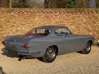 tweedehands Volvo P1800 Coupé Restored condition, Built by Jensen UK, Sophisticated color combination, Dark gray with red leather