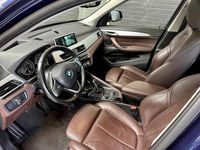 tweedehands BMW X1 SDrive18i High Ex. AUT.|PANODAK|SPORTLEDER|TREKHAA
