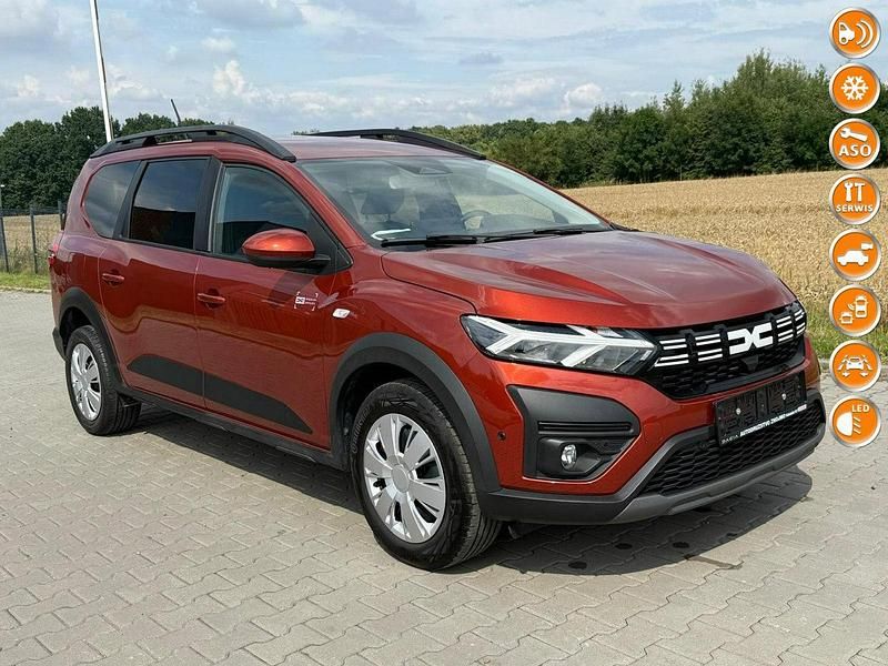 Bordowy (metalik) Używany 2024 Dacia Jogger Expression Minivan | 34 900 zł - Obraz 1/4