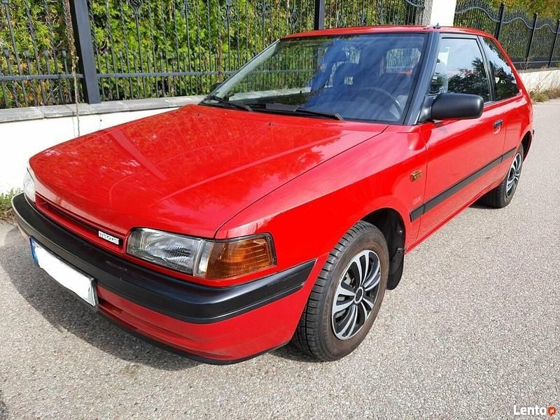 Czerwony Używany 1990 Mazda 323 Hatchback | 21 999 zł - Obraz 1/4