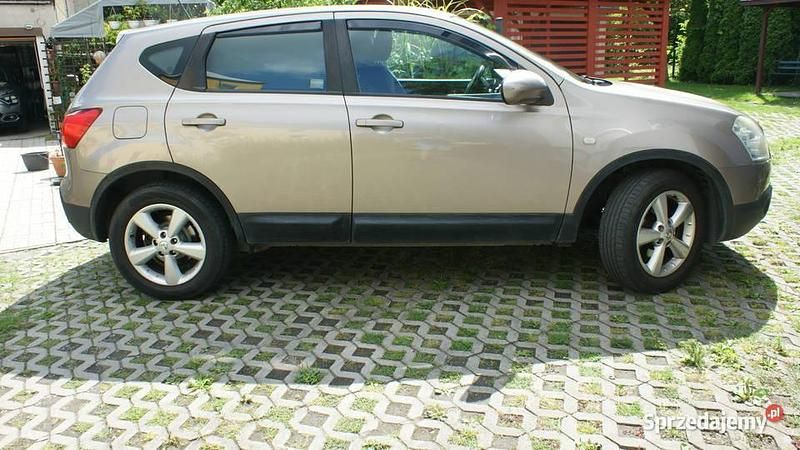 Beżowy Używany 2009 Nissan Qashqai SUV | 21 500 zł (Uczciwa cena) - Obraz 1/4