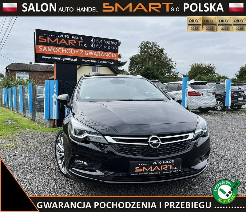 Czerwony Używany 2017 Opel Astra Kombi | 52 900 zł (Drogi) - Obraz 1/4