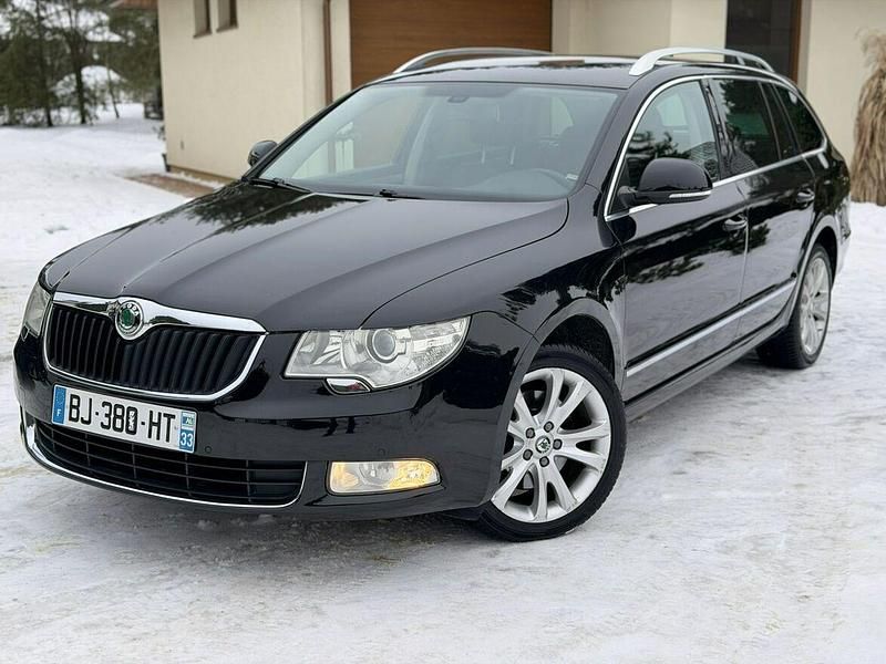 Używany Skoda Superb 170 KM (125 kW) 2011 Czarny (metalik) Kombi