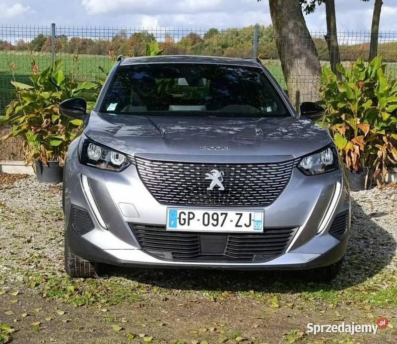 Szary Używany 2023 Peugeot e-2008 SUV | 67 999 zł - Obraz 1/4