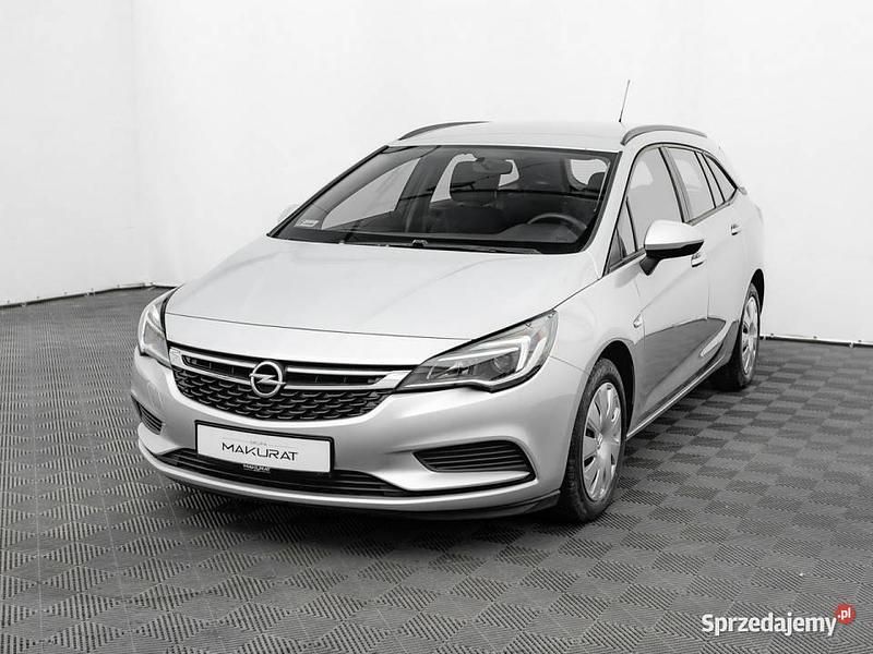 Srebrny Używany 2019 Opel Astra Enjoy Kombi | 35 800 zł (Uczciwa cena) - Obraz 1/4