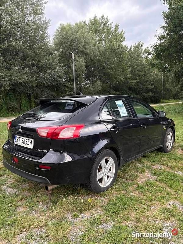 Czarny Używany 2010 Mitsubishi Lancer Sedan/Limuzyna | 20 000 zł (Uczciwa cena) - Obraz 1/4