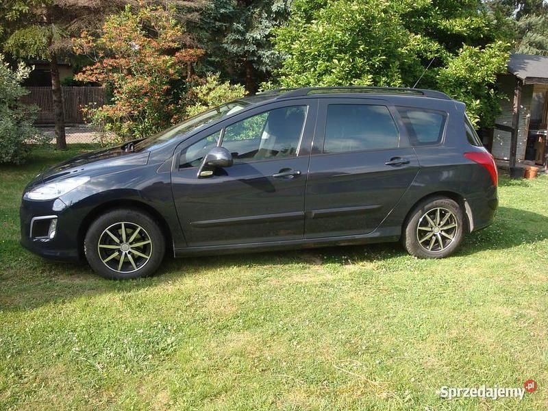 Granatowy Używany 2012 Peugeot 308 SW Kombi | 13 900 zł (Uczciwa cena) - Obraz 1/4