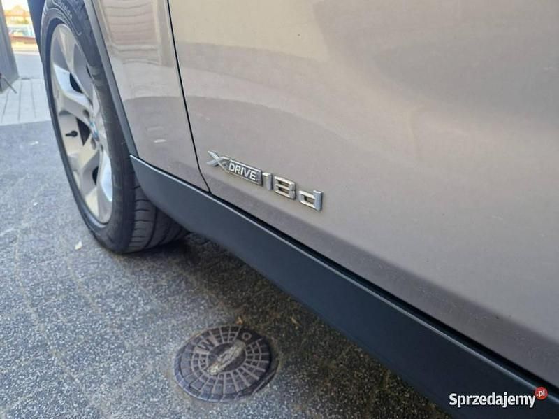 Używany BMW X1 143 KM (105 kW) 2010 Złoty SUV