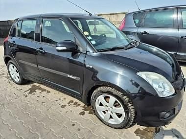 Czarny Używany 2009 Suzuki Swift Sedan/Limuzyna | 5900 zł - Obraz 1/4